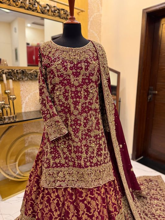 Elegant Maroon Bridal Lehenga with Heavy Golden Embroidery
