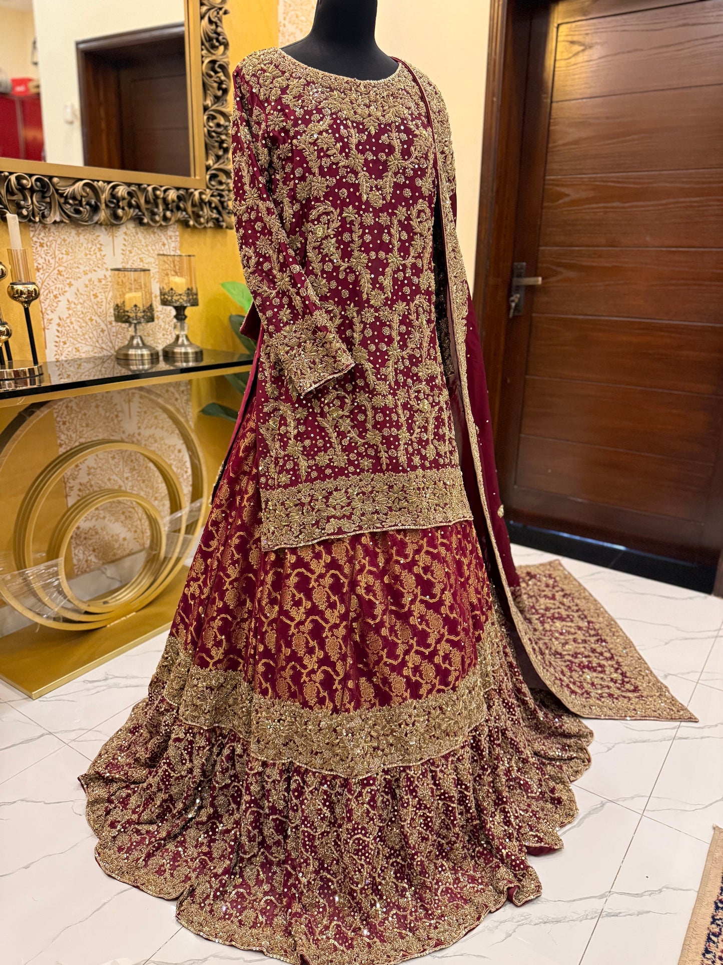 Elegant Maroon Bridal Lehenga with Heavy Golden Embroidery