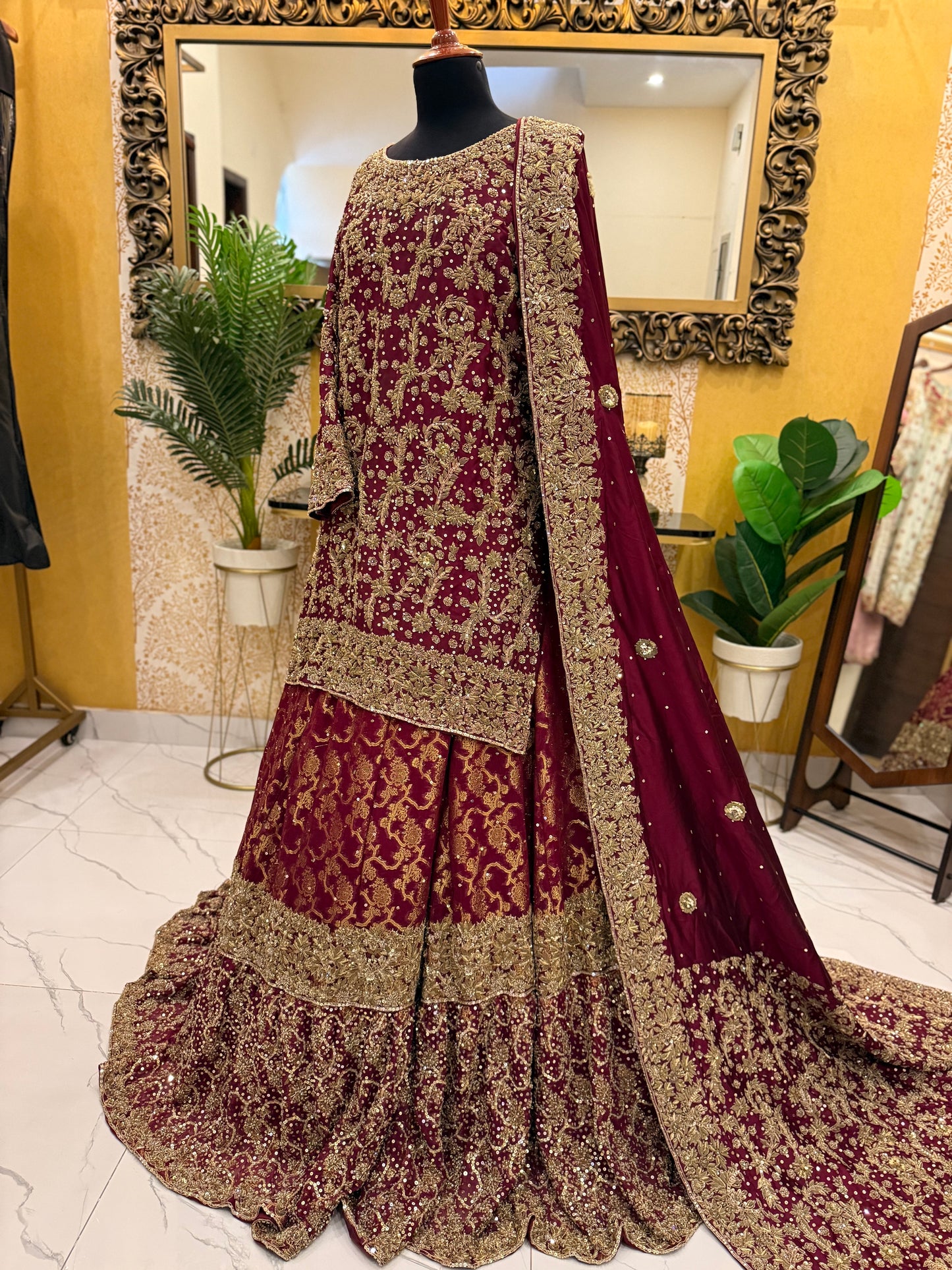 Elegant Maroon Bridal Lehenga with Heavy Golden Embroidery